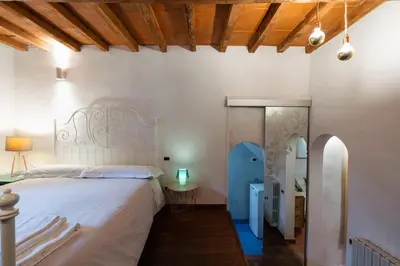 Letto o letti in una camera di Charming Apartment in the Heart of Santo Spirito