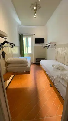 Letto o letti in una camera di San Lorenzo Dome