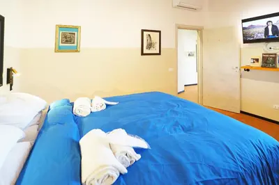 Letto o letti in una camera di San Lorenzo Dome