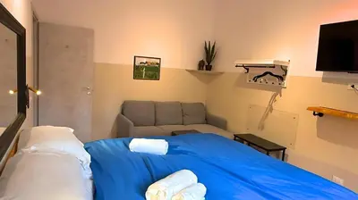 Letto o letti in una camera di San Lorenzo Dome
