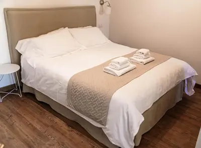 Letto o letti in una camera di Angie
