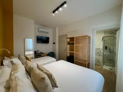 Letto o letti in una camera di Florentia Boutique