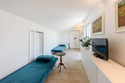 TV o dispositivi per l'intrattenimento presso The Luxor Suites - Larione