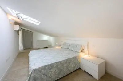 Letto o letti in una camera di The Luxor Suites - Larione