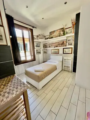 Letto o letti in una camera di Guest House Biffi Simone