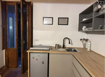 Cucina o angolo cottura di Rustico monolocale soppalcato a Firenze