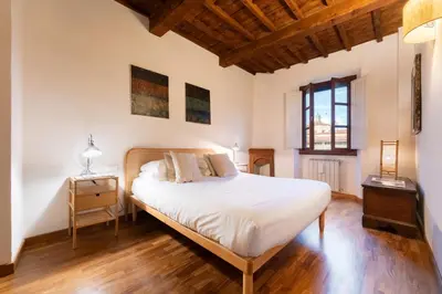 Letto o letti in una camera di Via dei Pilastri, 44 - Charming and Cozy Apartment in Florence Historic Cente