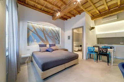 Letto o letti in una camera di Palazzo Mannaioni Suites