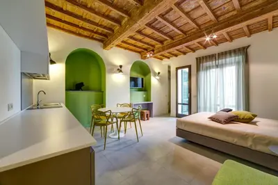Letto o letti in una camera di Palazzo Mannaioni Suites