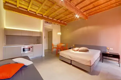 Letto o letti in una camera di Palazzo Mannaioni Suites
