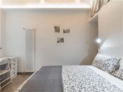 Letto o letti in una camera di Interludio Fiorentino