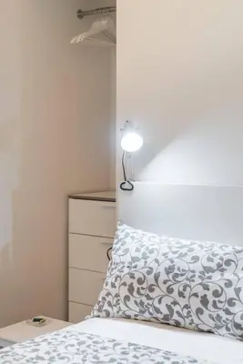 Letto o letti in una camera di Interludio Fiorentino