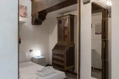 Letto o letti in una camera di San Jacopo Loft