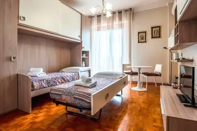 Letto o letti in una camera di Firenze Bellariva Riverside Stay
