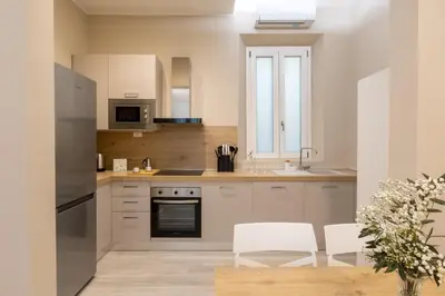 Cucina o angolo cottura di Bianca - Roby - Paolo Apartments by Mamo Florence