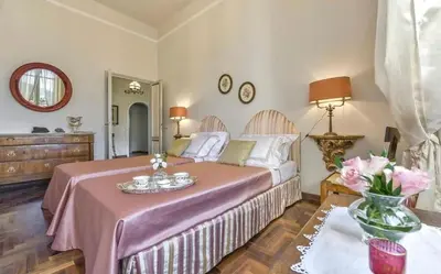 Letto o letti in una camera di Villa Gelly