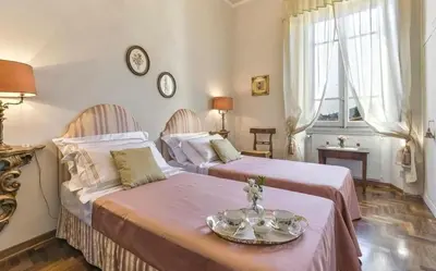 Letto o letti in una camera di Villa Gelly