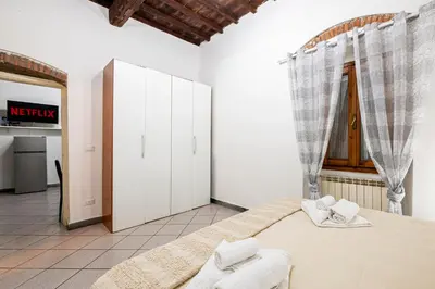 Letto o letti in una camera di The Luxor Suites - Rosina