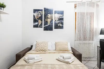 Letto o letti in una camera di The Luxor Suites - Rosina