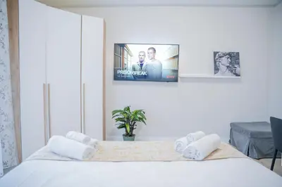 Letto o letti in una camera di Your Home in Florence with parking, 10 min from the center by Tram