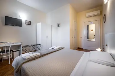 Letto o letti in una camera di Maison Bianca B&B