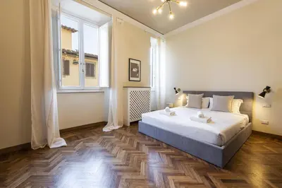 Letto o letti in una camera di GOLDEN LUXE - Penthouse in Piazza della Signoria Duomo view