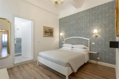 Letto o letti in una camera di Relais Sampaoli