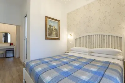 Letto o letti in una camera di Relais Sampaoli