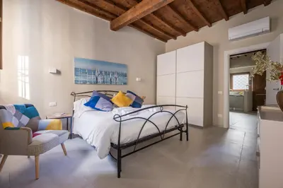 Letto o letti in una camera di Dimora Camaldoli - Authentic Florence Experience