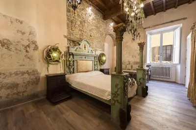 Letto o letti in una camera di Torre Benci by MMega
