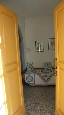 Letto o letti in una camera di Polcanto i Castagni appartamento in casa colonica
