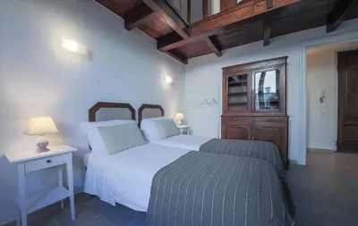 Letto o letti in una camera di Palace First
