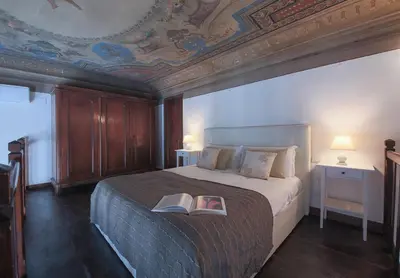 Letto o letti in una camera di Palace First