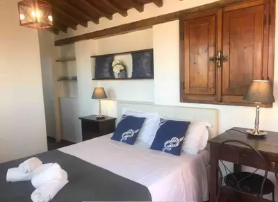 Letto o letti in una camera di Palace Top Lovely city view and private parking