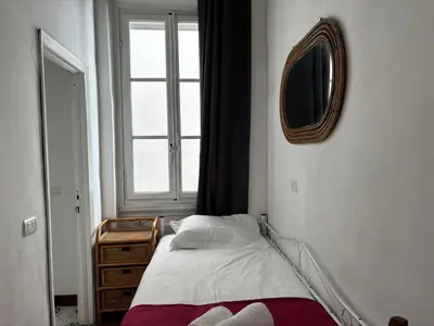 Letto o letti in una camera di Palace Top Lovely city view and private parking