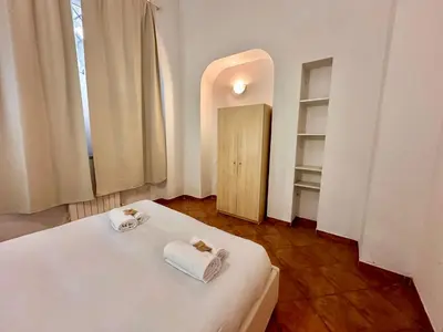 Letto o letti in una camera di A Due Passi Dall'Accademia