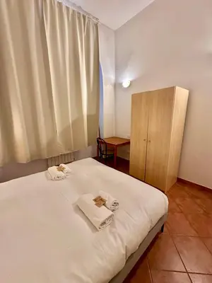 Letto o letti in una camera di A Due Passi Dall'Accademia