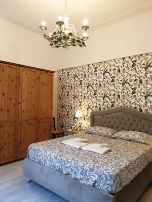 Letto o letti in una camera di Florence Home