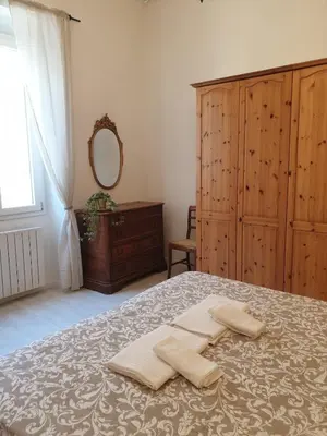 Letto o letti in una camera di Florence Home