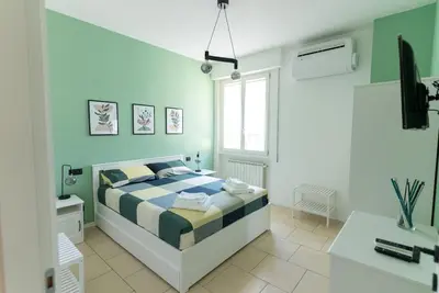Letto o letti in una camera di Modern Cosy Apartment Near Florence City Center
