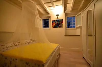Letto o letti in una camera di La Culla del Centro