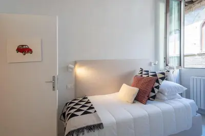 Letto o letti in una camera di Belle Donne Apartment