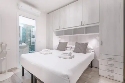 Letto o letti in una camera di Corte Santa Maria - Florence Dolce Vita
