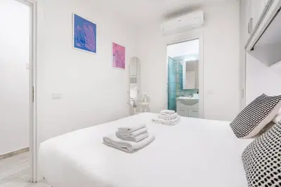 Letto o letti in una camera di Corte Santa Maria - Florence Dolce Vita