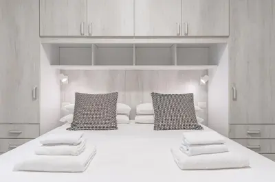 Letto o letti in una camera di Corte Santa Maria - Florence Dolce Vita