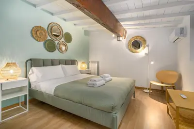 Letto o letti in una camera di Vinegia Apartments By San Firenze Collection