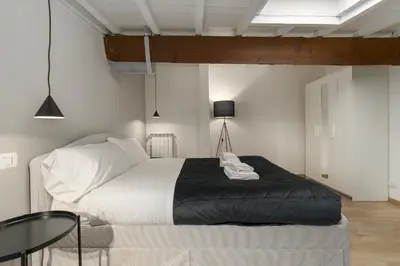Letto o letti in una camera di Vinegia Apartments By San Firenze Collection
