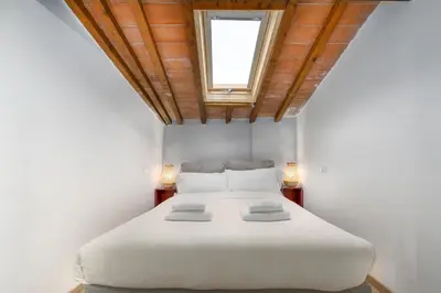 Letto o letti in una camera di Vinegia Apartments By San Firenze Collection