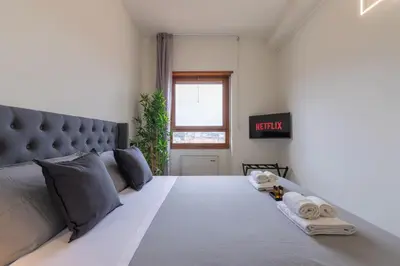 Letto o letti in una camera di Castle Free Private Parking 18 min di treno Firenze