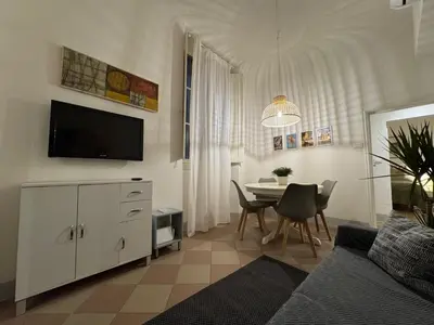TV o dispositivi per l'intrattenimento presso Ambrogio 33 - three bedrooms three bathrooms